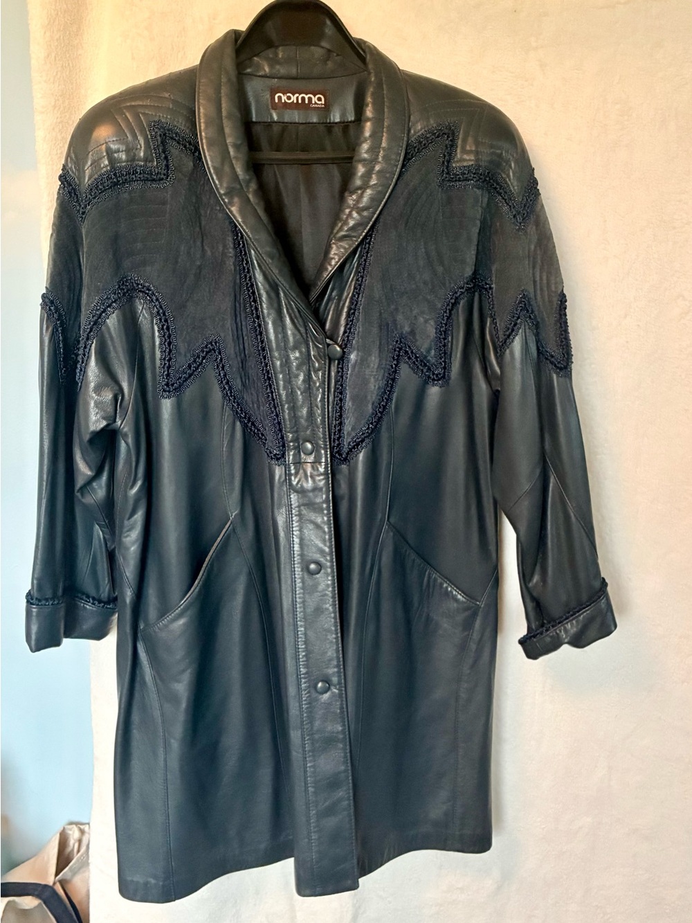 Women's Vintage Leather Coat with Decorative Stitching.